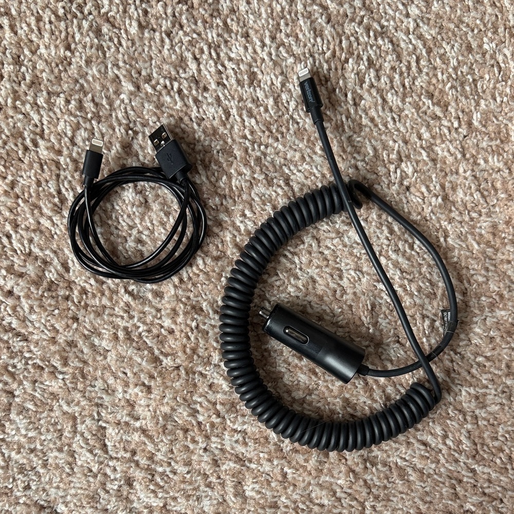 One Lightning to USB Charging Cable and one Verizon Coiled Car Charger